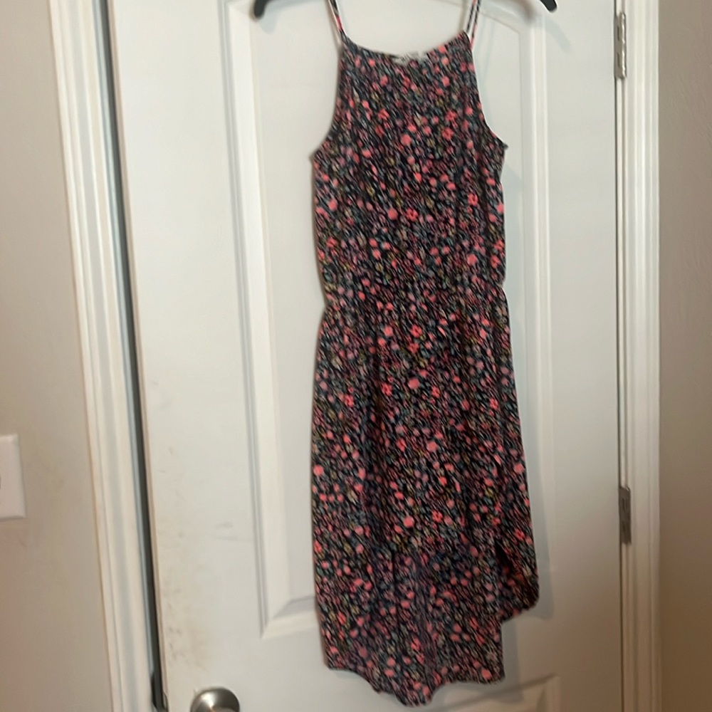 Adorable floral romper for juniors.